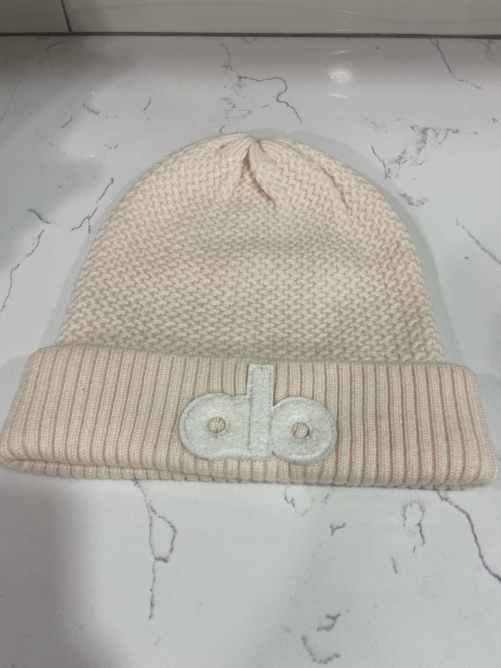 ALO Yoga Cream Knit Beanie with Raised Logo Patch